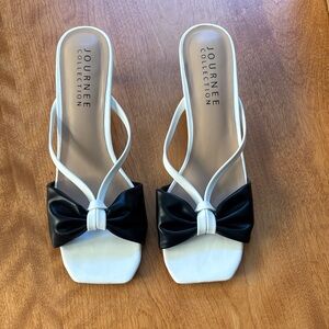 Journee Collection White Slide Mules with Black Bow Accent